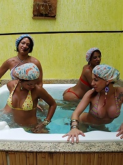 Bikini wearing shemales in hot tub fucking